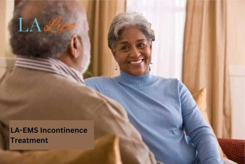 Couple sat smiling at each other - LA-EMS treatment Tyne & Wear