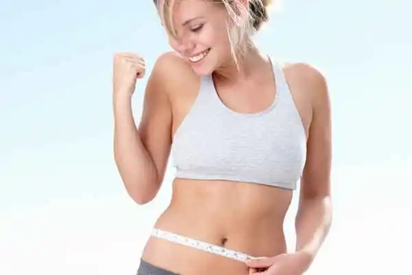 woman happy after fat reduction treatment Tyne & Wear